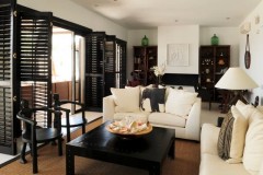 black-plantation-shutters-Living-Room-Tropical-with-african-influence-beach-house